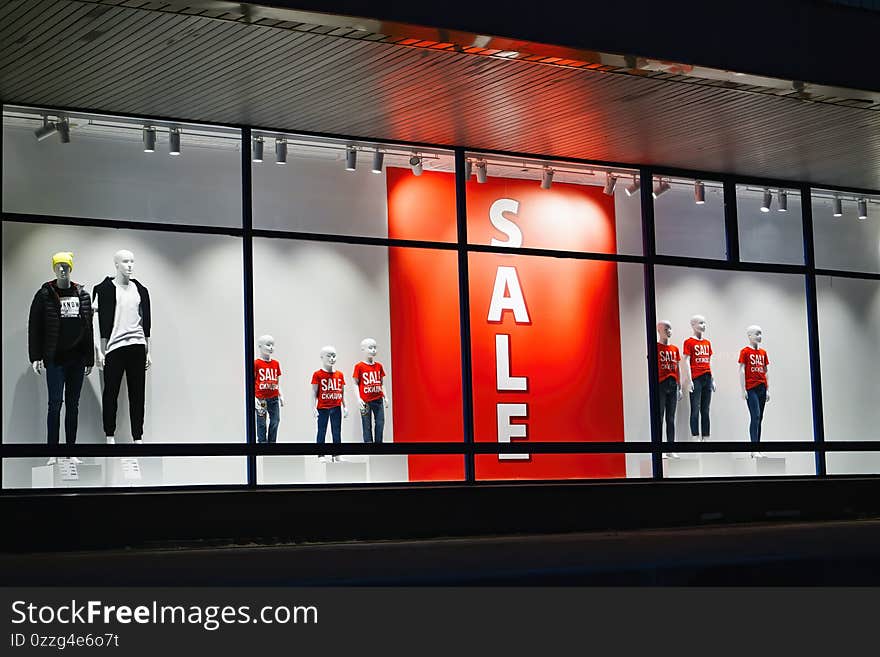 Orange Color Of Sales Banner In Store Window