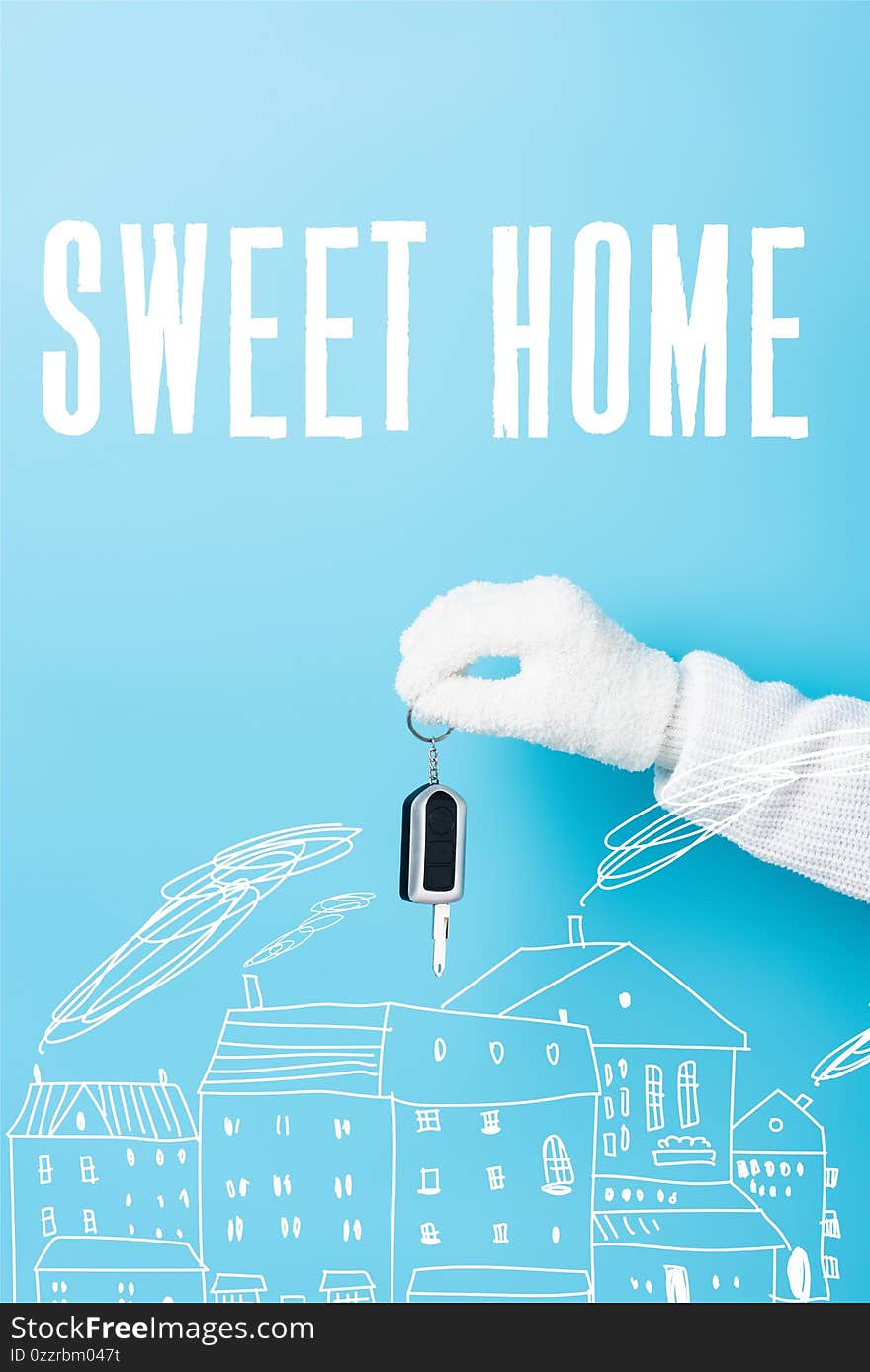 Cropped view of woman in white glove holding key near sweet home lettering and houses illustration on blue. Cropped view of woman in white glove holding key near sweet home lettering and houses illustration on blue