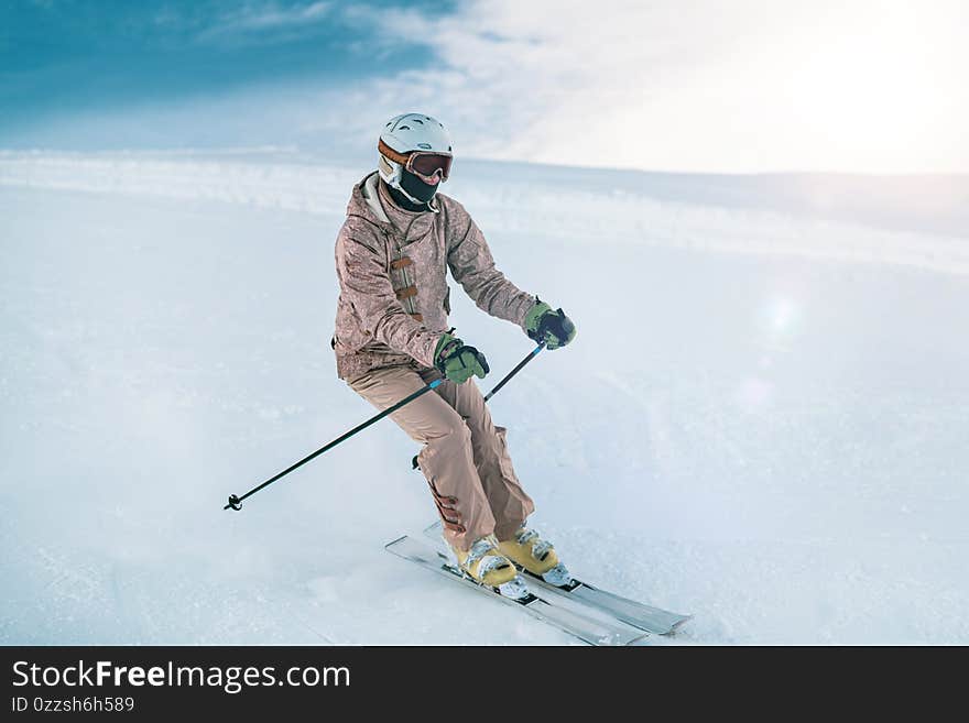 Woman skiing on mountain top