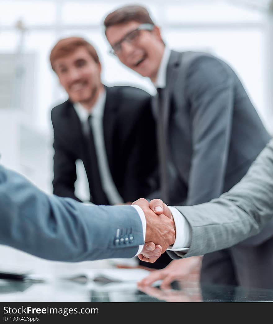 Close up. business handshake in a modern office . business concept