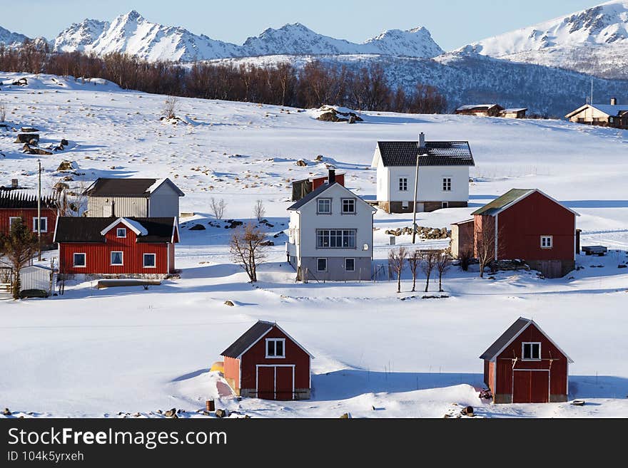 Small Norwegian village on the shore of the fjord