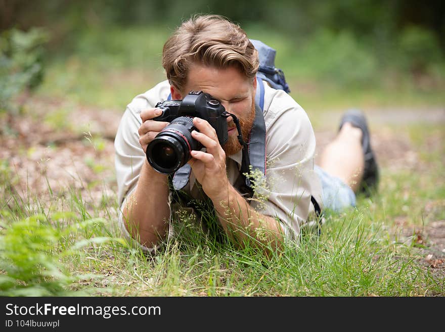 Wildlife photographer outdoor in action