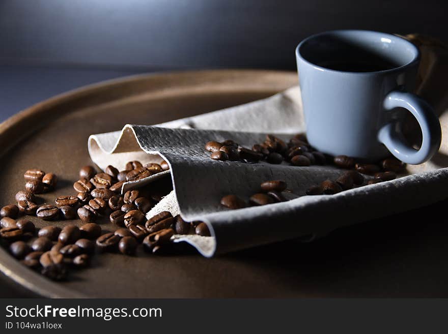 view of espresso cup and coffee beans