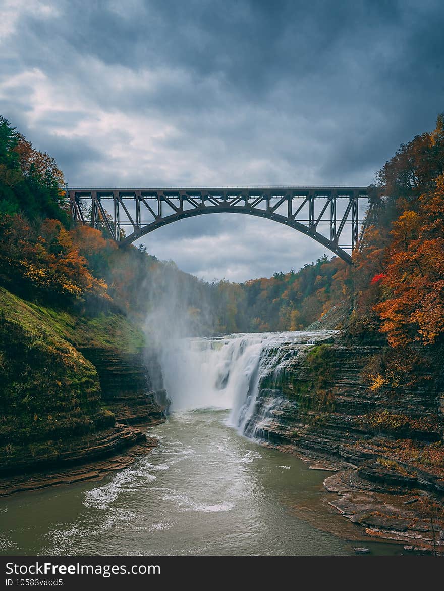 Upper Falls and the Portage Viaduct with autumn color, at Letchworth State Park, New York