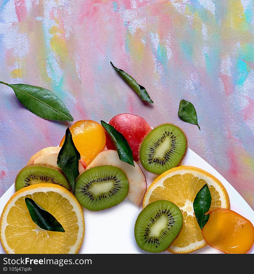 Kiwi, persimmon and apples for pure nutrition. On a light background. View from above