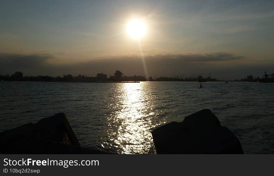 sunset in Veracruz port nears ships