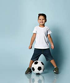 Boy Playing Soccer, Happy Child, Young Male Teenager Goalkeeper Enjoying Sports Game, Holding Ball Stock Photos