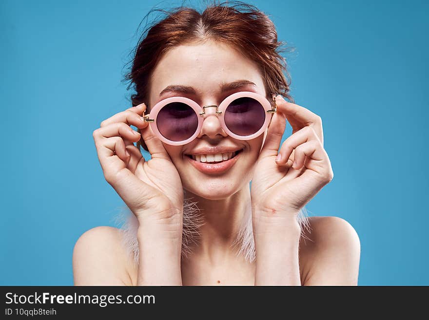 beautiful woman naked shoulders fluffy earrings sunglasses accessories makeup