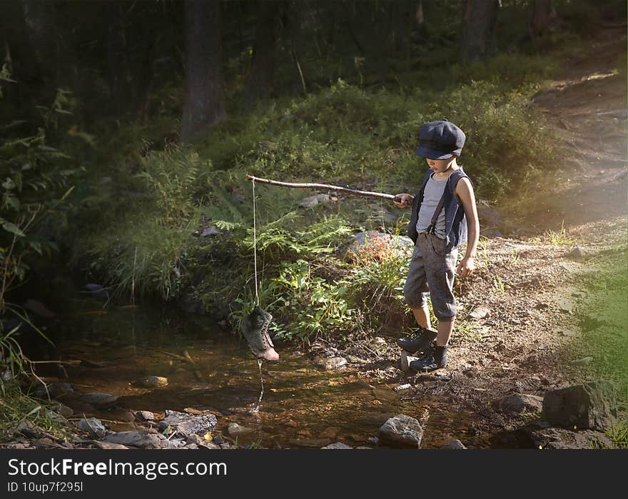 4 year old boy, fishing for dinner. Hoping to get something other than an old shoe. 4 year old boy, fishing for dinner. Hoping to get something other than an old shoe.