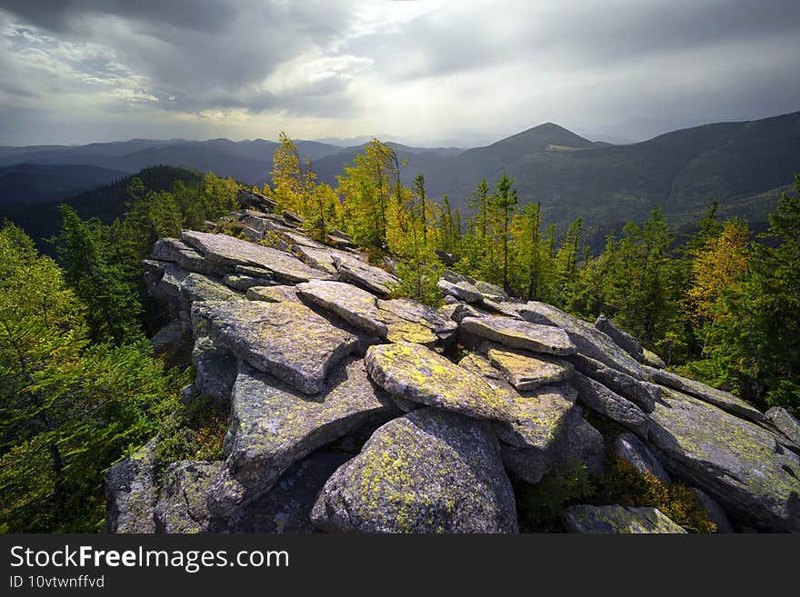 Hurricane wind in autumn mountains