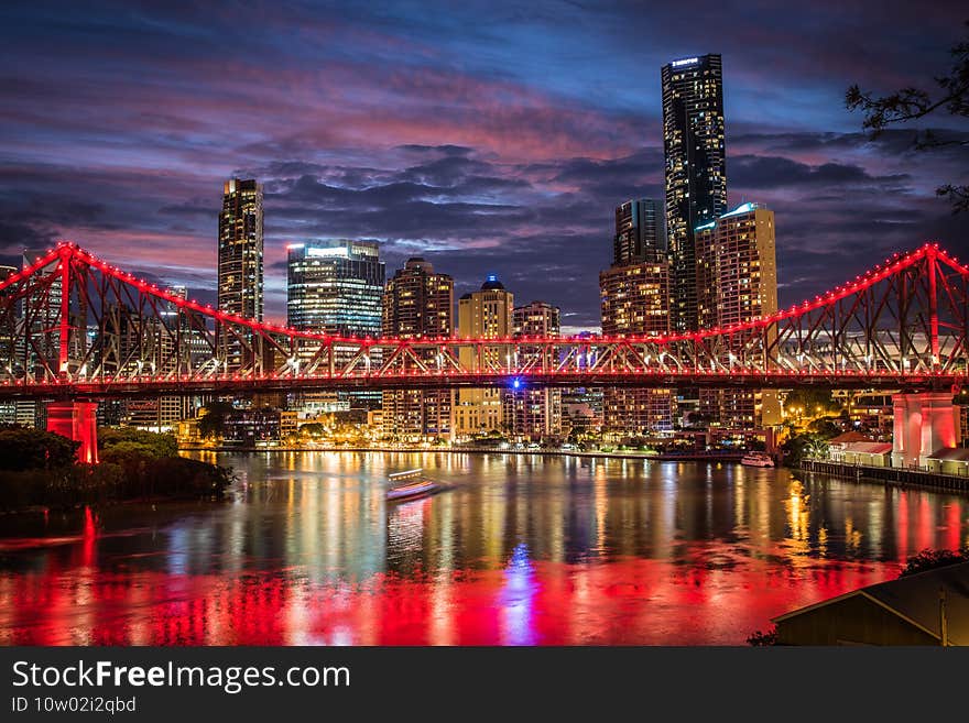 Brisbane s Storey Bridge at night with reflections.