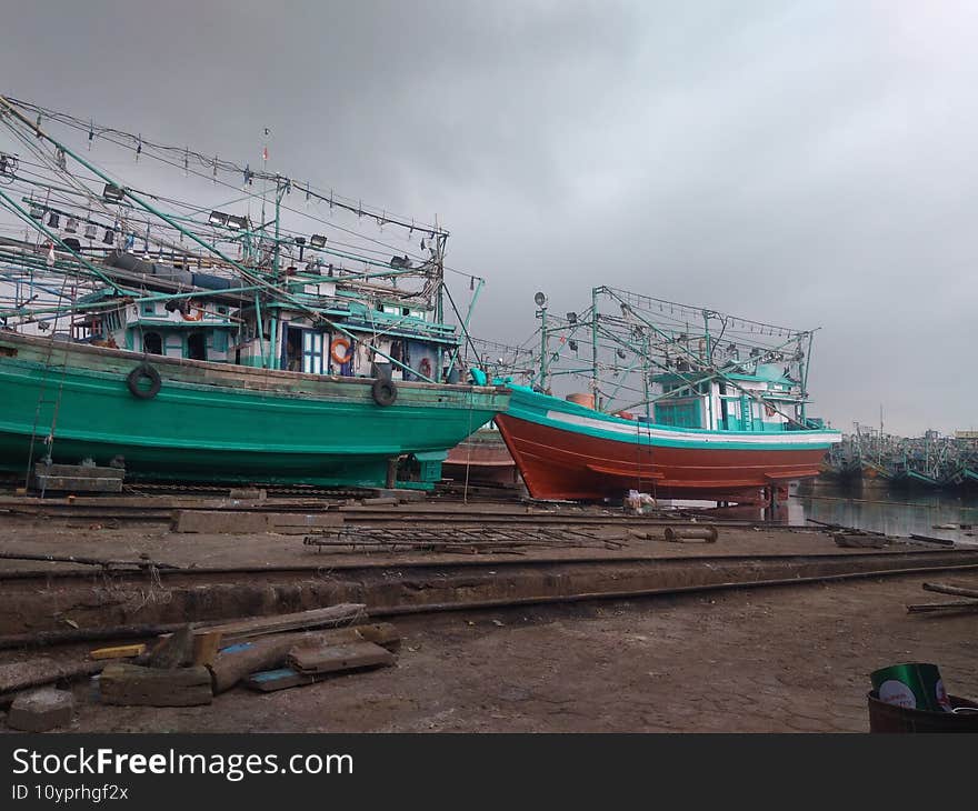 Traditional Fisherman Ship, Jakarta, Indonesia - 2021. Traditional fisherman ship is being repaired in the workshop