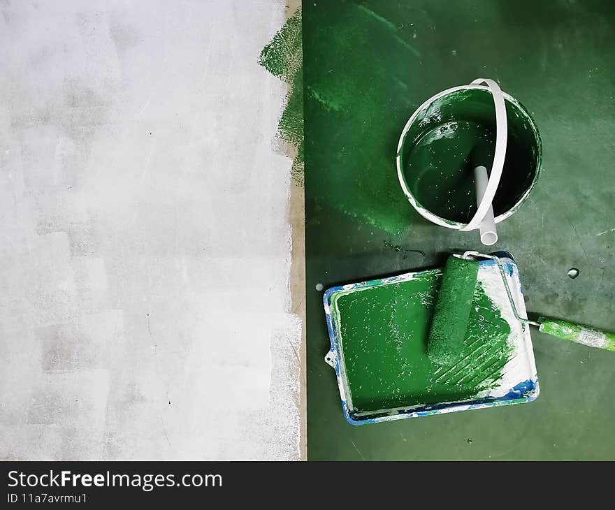 Painting of white and green colour on the floor