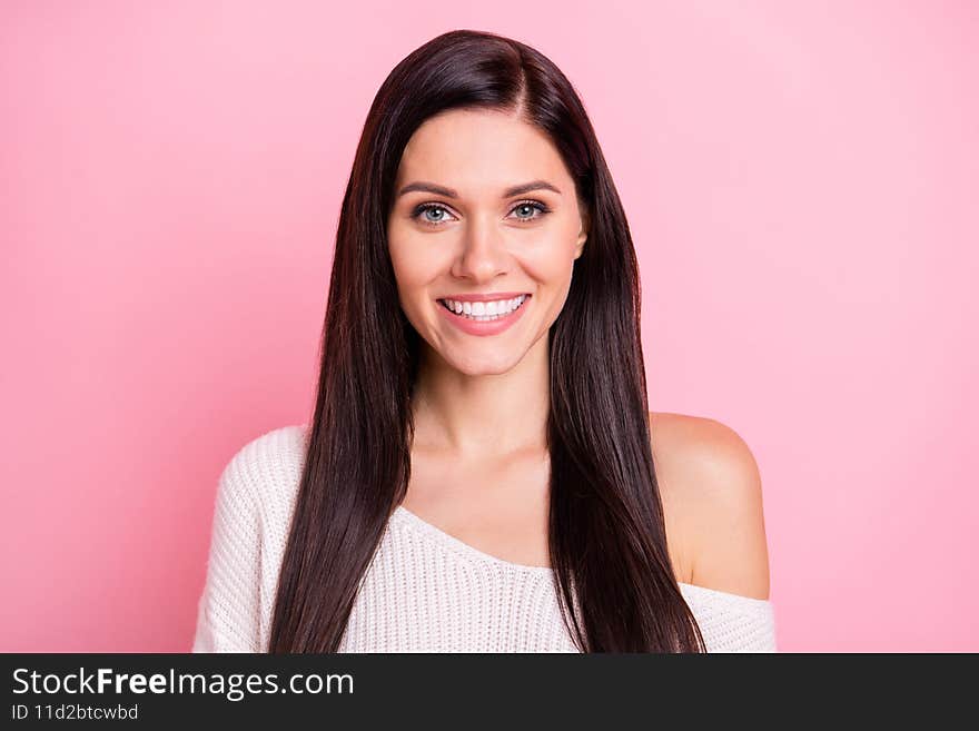 Portrait of young beautiful attractive cheerful girl with long brown hair smiling look camera isolated on pink color