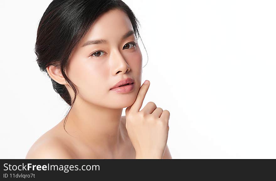 Beautiful young asian woman with clean fresh skin on white background, Face care, Facial treatment, Cosmetology, beauty and spa