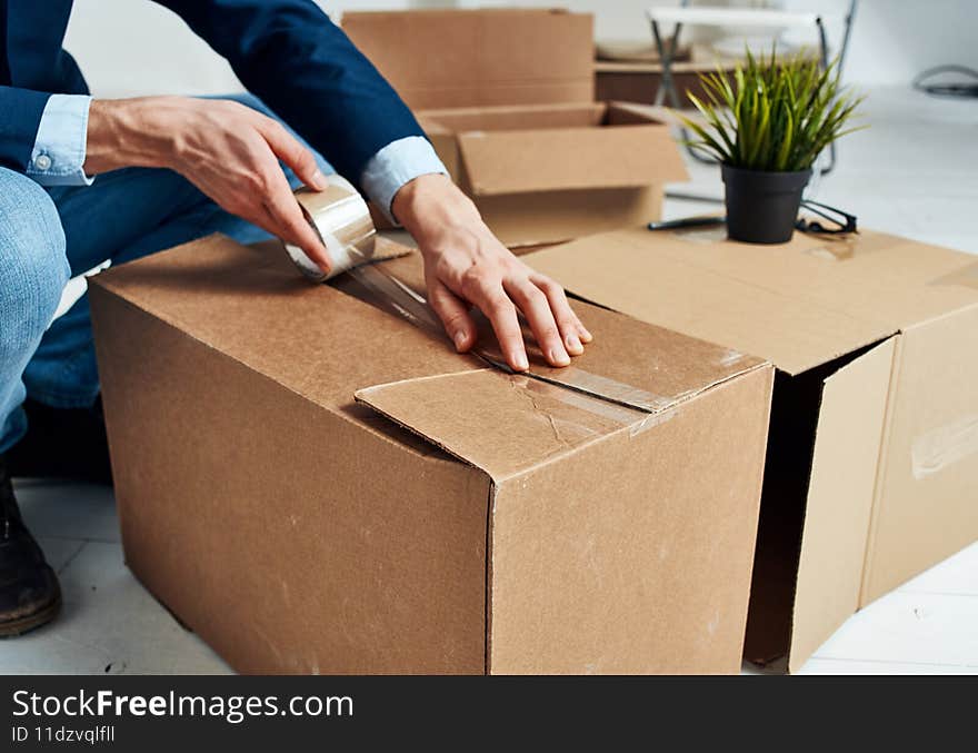 Packing boxes collecting things office work of a professional. High quality photo