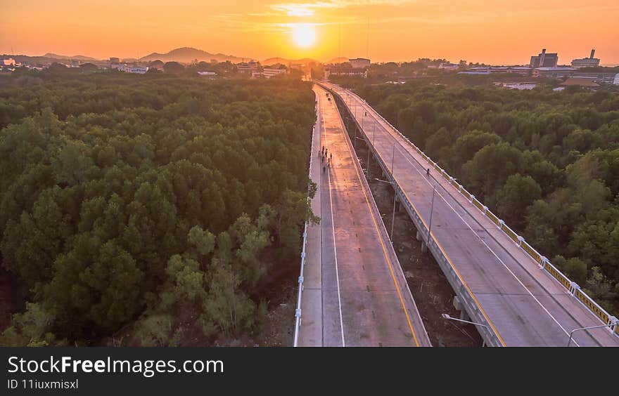 The sun rises over Thepsrisin Bridge. Thepsrisin Bridge is a shortcut to connect the city from Saphan Hin intersection with Sakdidet intersection in order to reduce the bad traffic congestion. The sun rises over Thepsrisin Bridge. Thepsrisin Bridge is a shortcut to connect the city from Saphan Hin intersection with Sakdidet intersection in order to reduce the bad traffic congestion