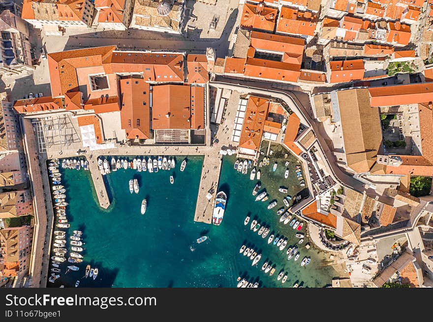 Aerial overhead drone shot of old town port in Dubrovnik in Croatia summer morning time