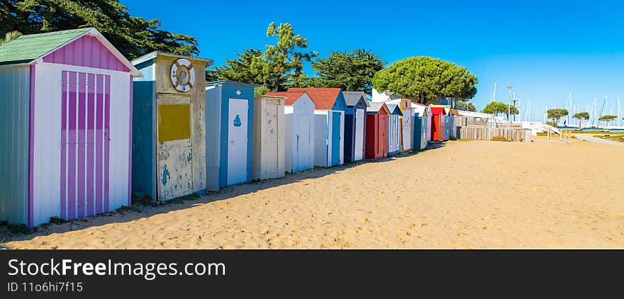 Wooden beach cabins on the Oleron island in France, colorful huts