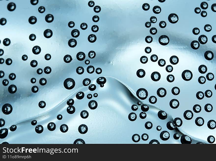 Abstract artistic background bubbles in a plastic bottle with drinking water close-up macro photography