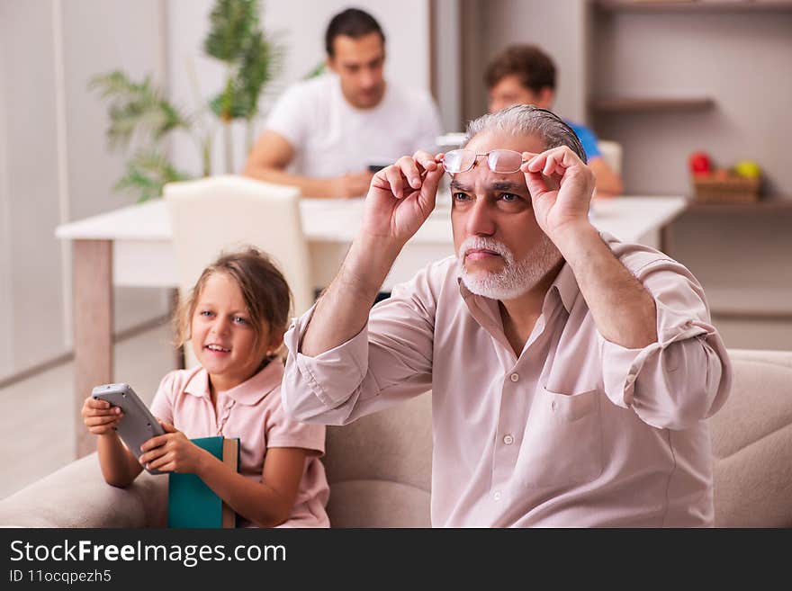 Three generations at home in early development concept. Three generations at home in early development concept