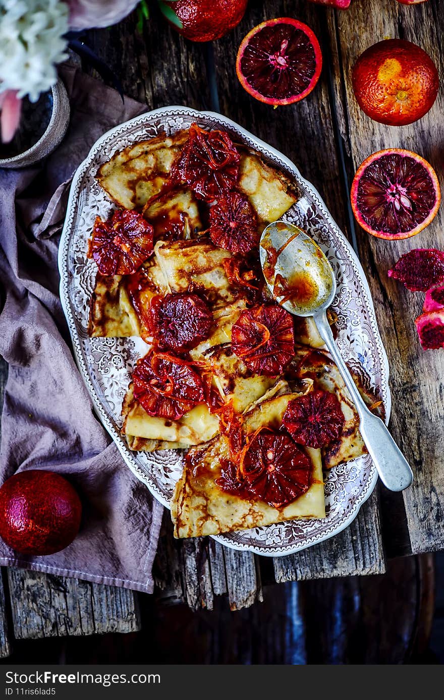 Crepe suzette with bloody oranges .selective focus