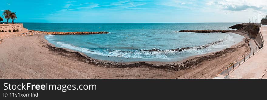 Panoramic view of a beach in the mediterranean village of Ametlla de mar, in Tarragona. Spain.