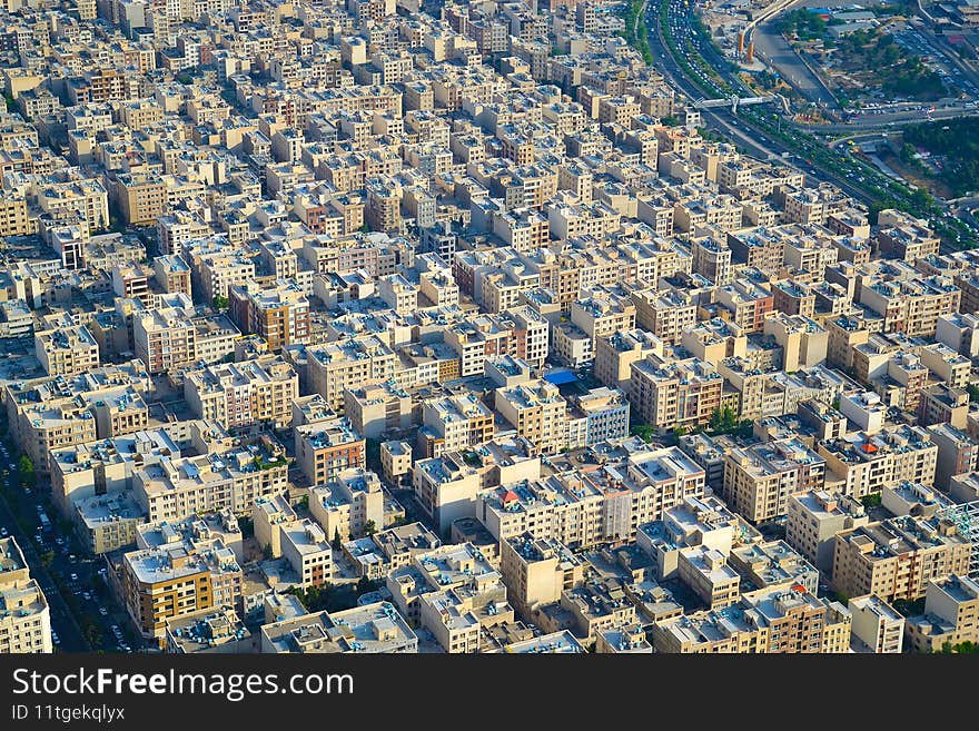 View of the city, highway and surrounding houses from the Milad Tower Borj-e Milad in Tehran. Milad Tower is the most important
