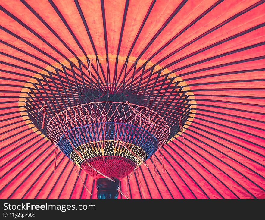 A closeup of a beautiful Japanese traditional red umbrella