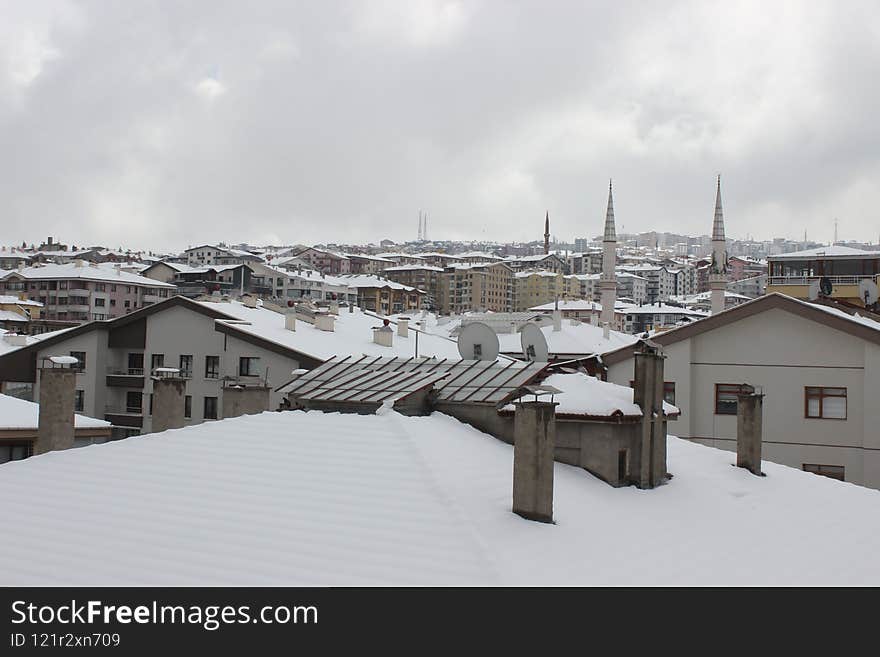 Lots of covered areas in snow around the city. Lots of covered areas in snow around the city