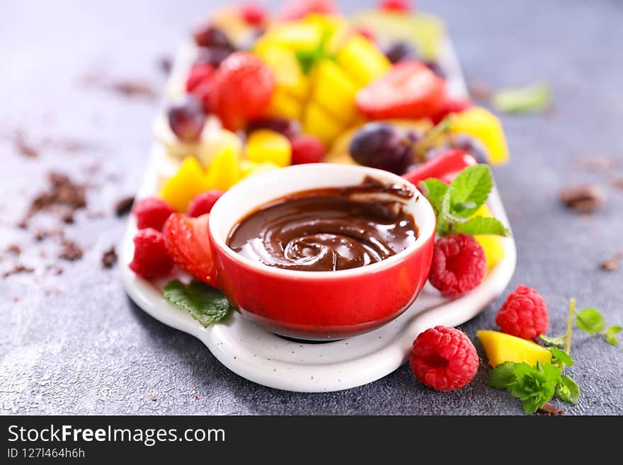 Chocolate dip and fresh fruit. Chocolate dip and fresh fruit
