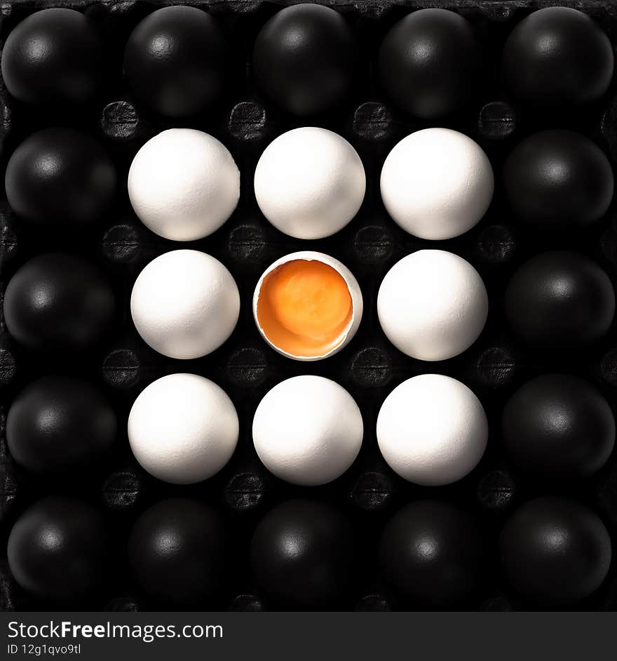 Black and White Eggs. Cultural Diversity Concept Image. Flat Lay Abstract Pattern