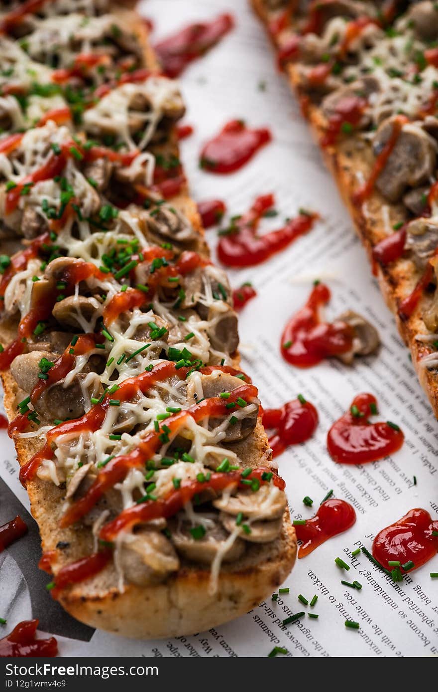 Polish Street Food Zapiekanka Baguette with Mushrooms, Onion, Cheese and Ketchup