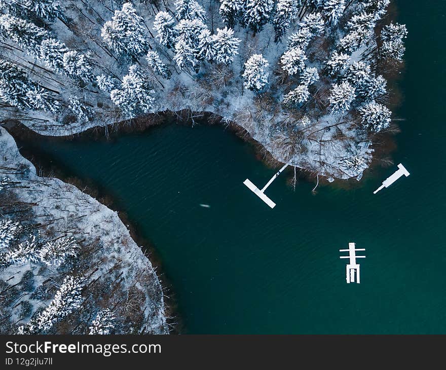 Beautiful Winter Landscape. Wooden Deck at the Lake