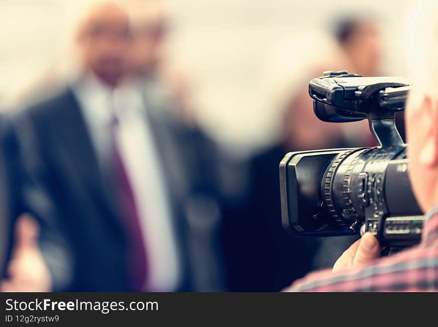 Cameraman recording conference