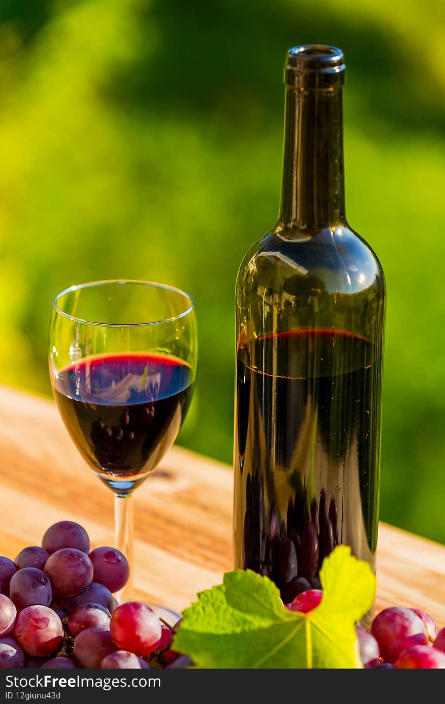 Wine bottle and grapes