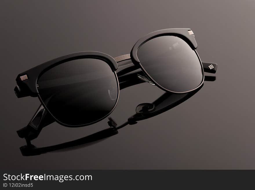 Sunglasses On Gray Background .
