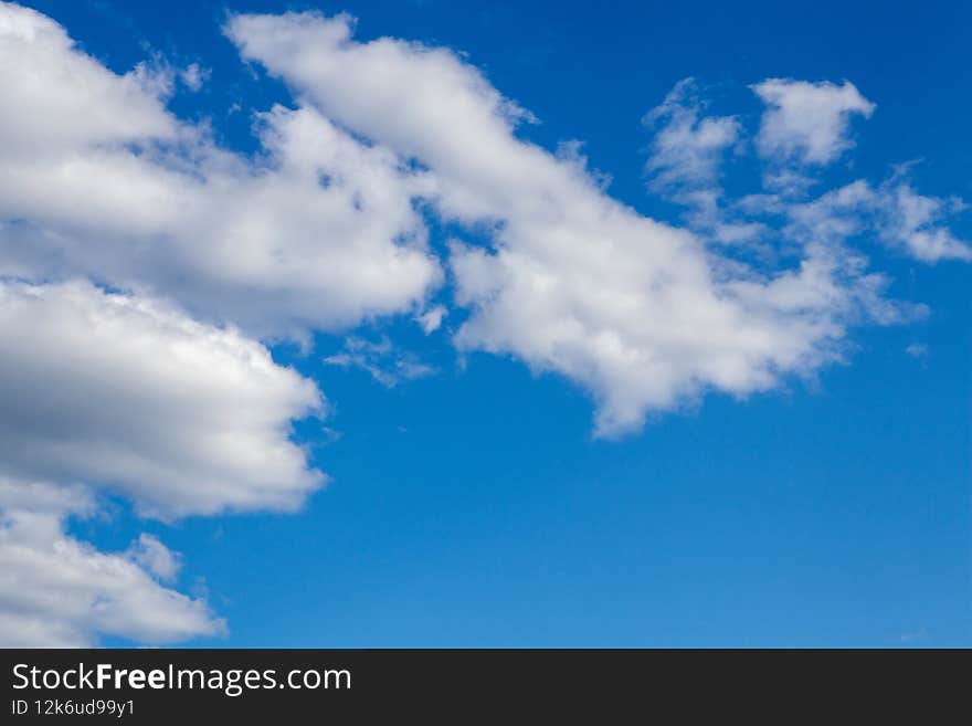 White clouds against a blue sky. White clouds against a blue sky