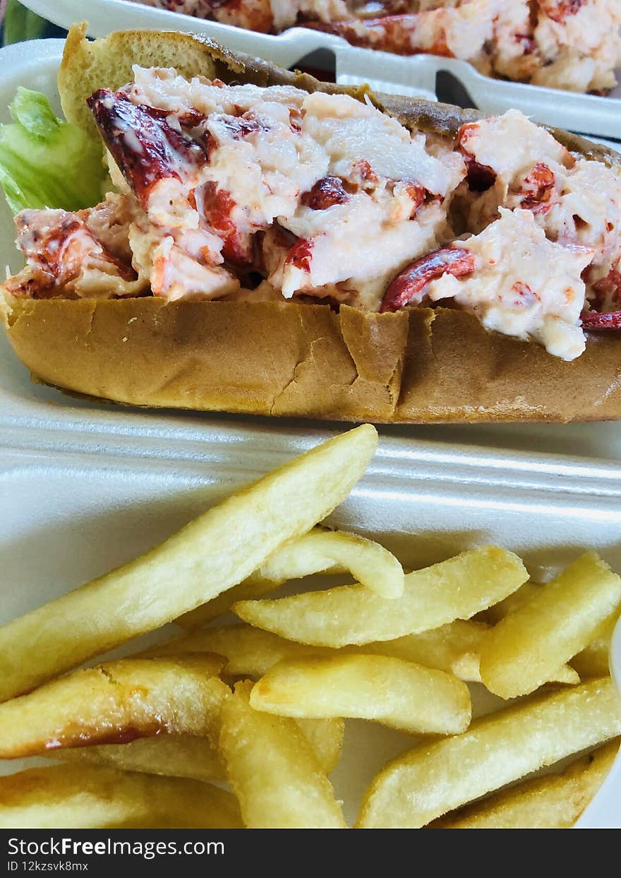 A new england favorite, Maine lobster rolls, juicy meat, with a little mayo on a toasted hot dog bun, and gotta have the side of french fries, and washed down with a coca cola or a an iced cold beer. A new england favorite, Maine lobster rolls, juicy meat, with a little mayo on a toasted hot dog bun, and gotta have the side of french fries, and washed down with a coca cola or a an iced cold beer.