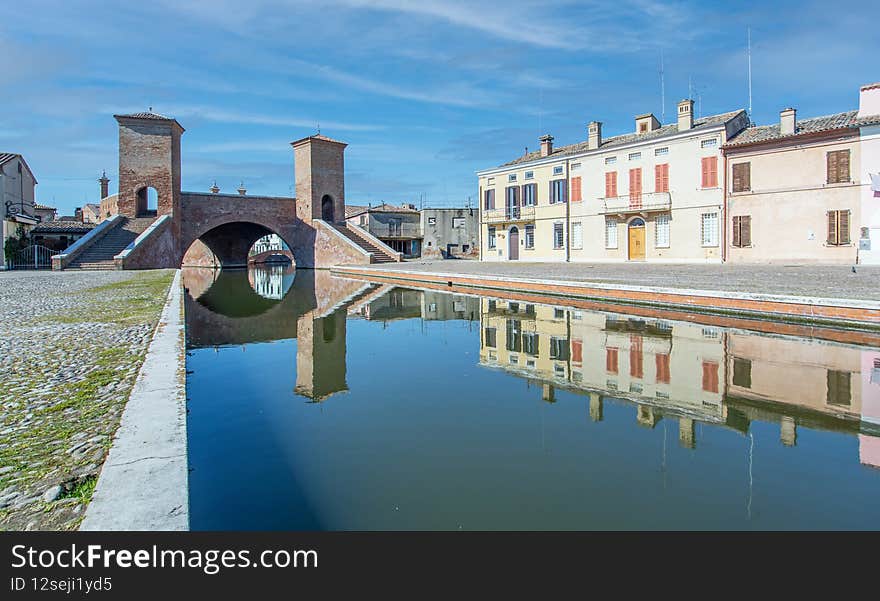 Comacchio, Italy - often compared to Venice for the canals and the architecture, Comacchio displays one of the most characteristic old towns in Emilia Romagna. Comacchio, Italy - often compared to Venice for the canals and the architecture, Comacchio displays one of the most characteristic old towns in Emilia Romagna