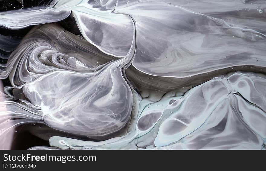 The colors of the aqueous ink are translucent. Abstract multicolored marble texture background