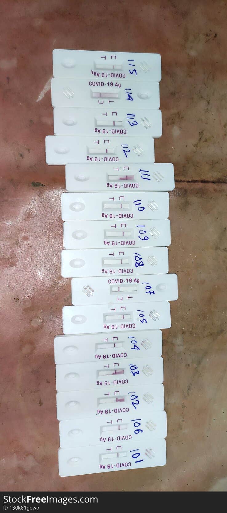 Corona virus Covid19 rapid antigen testing kit under observation after swab collection and test on the table numbered arranged in line.