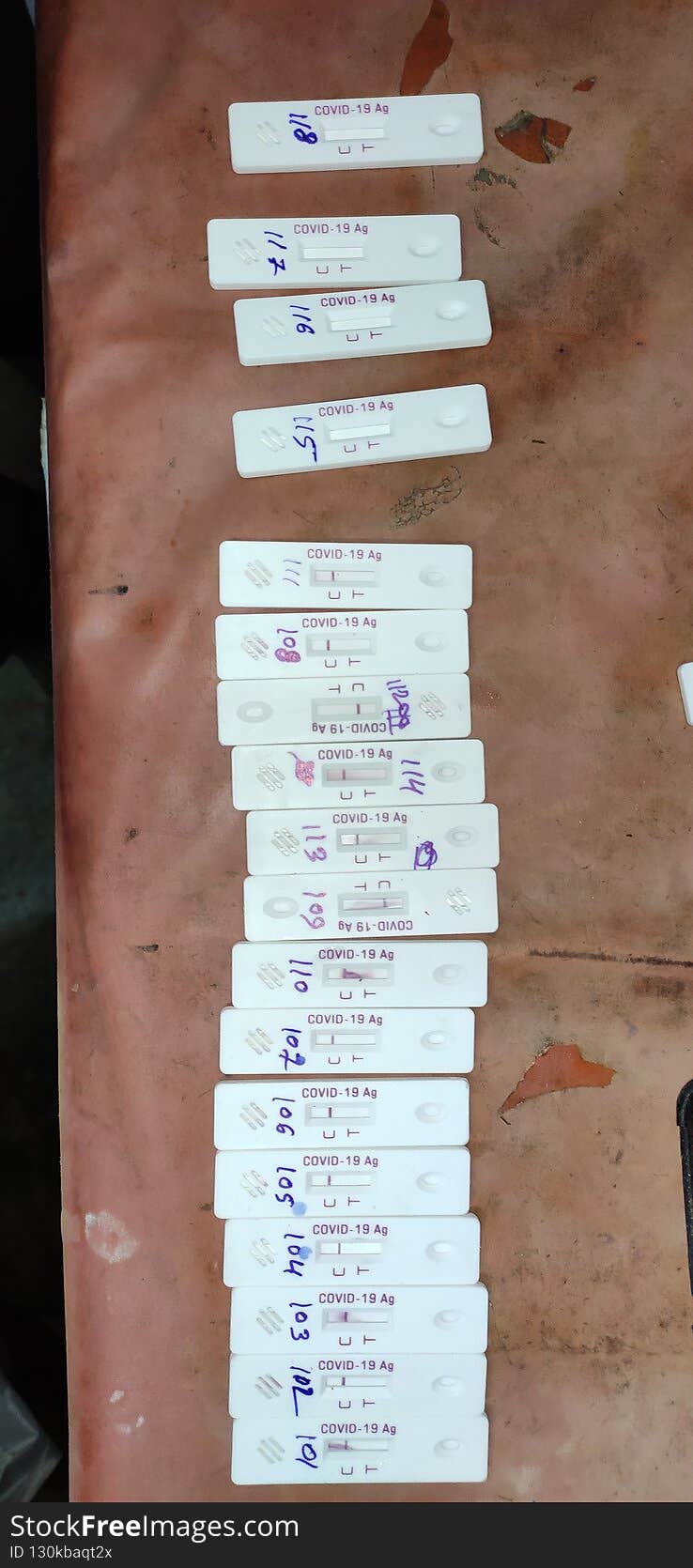 Corona virus Covid19 rapid antigen testing kit under observation after swab collection and test on the table numbered arranged in line.