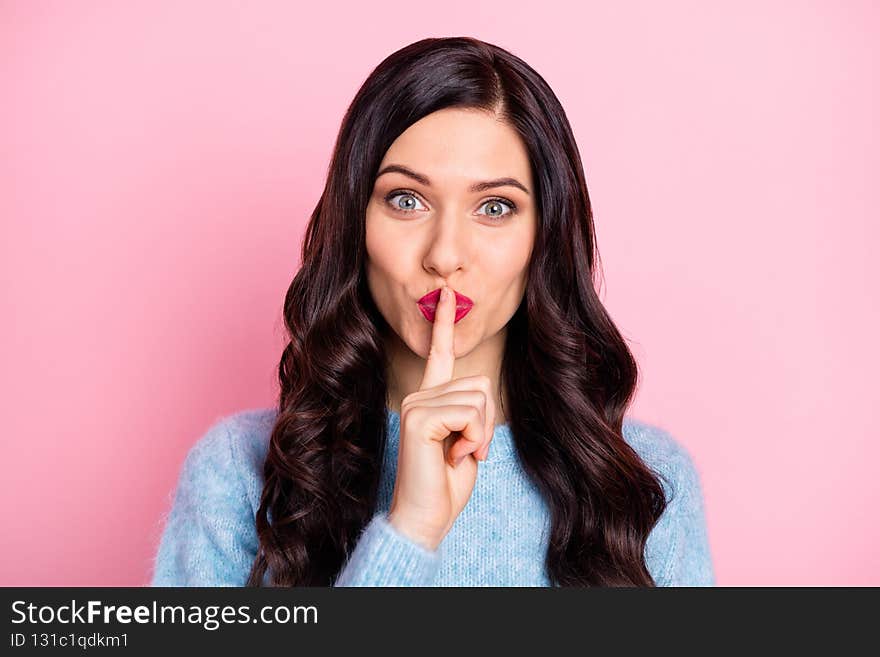 Photo of cunning funny lady lips cover lips mouth look camera wear blue sweater isolated pink color background.