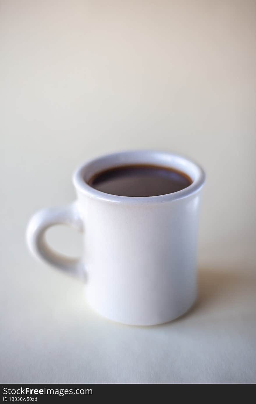 Cup of coffee on white background