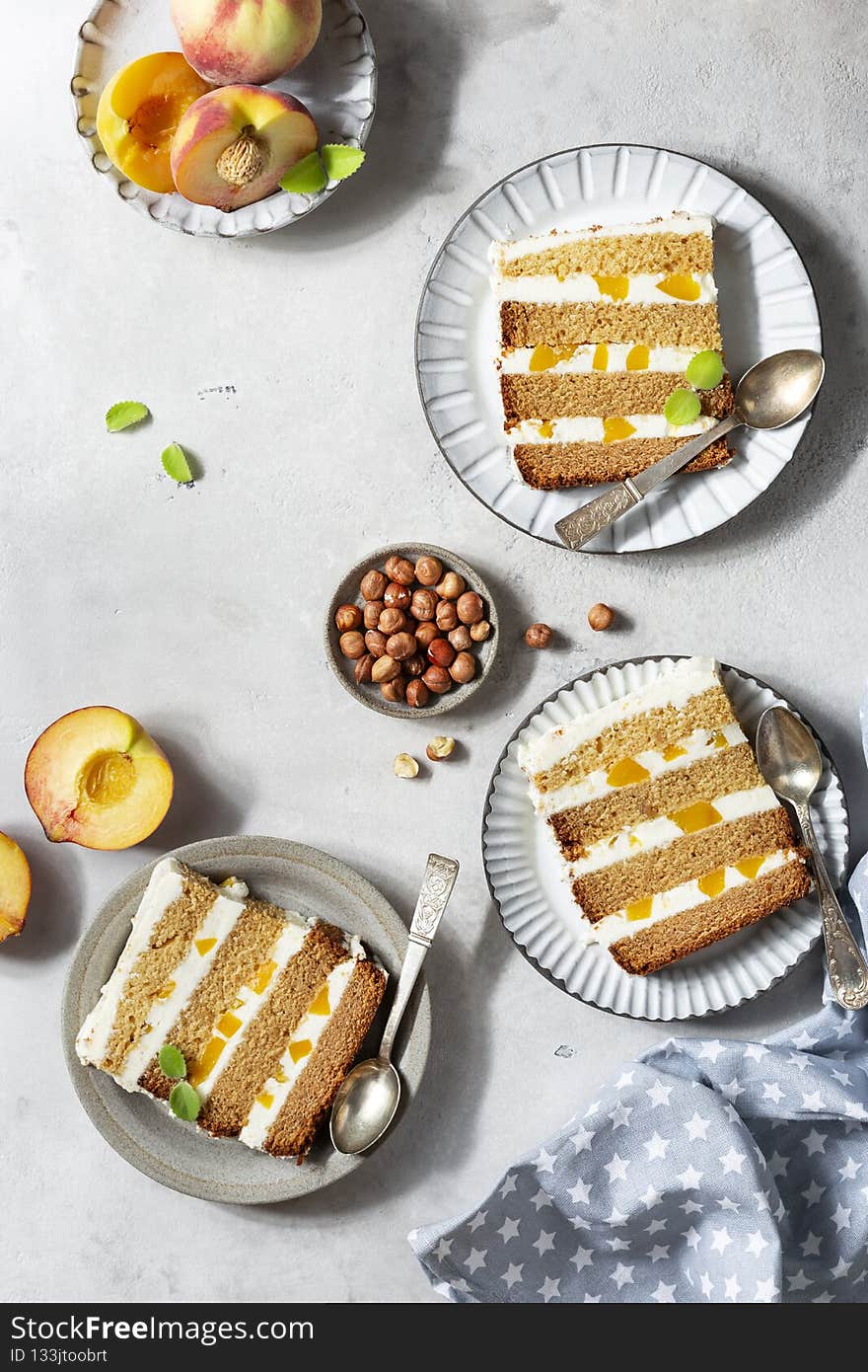 slices of peach cake with buttercream and honey