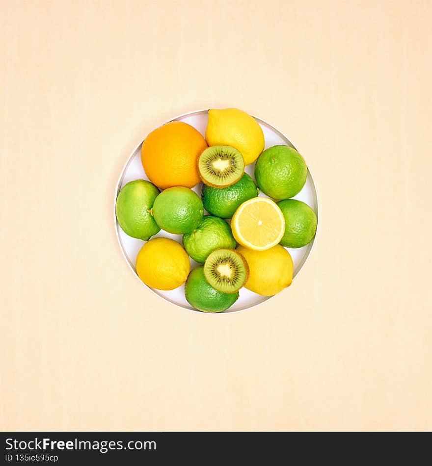 Fresh ripe citrus fruits on blue background.