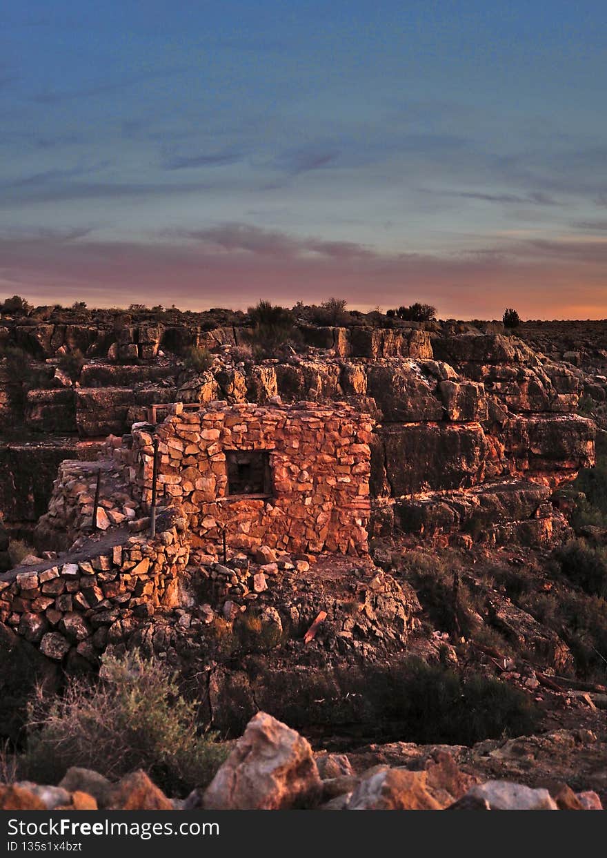 Sunset over the remains of the ghost town of Two Guns and Diablo Canyon near Winslow, Arizona. Sunset over the remains of the ghost town of Two Guns and Diablo Canyon near Winslow, Arizona.