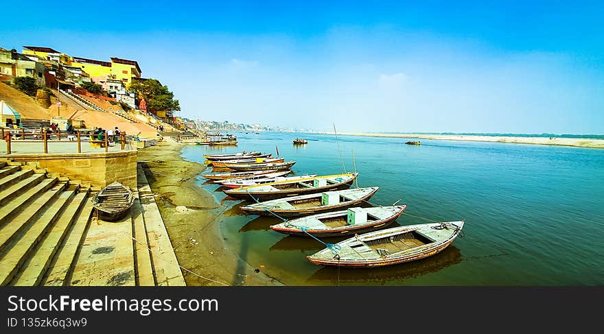 Boats anchored close to the Ganges river ghat in Varanasi, India.