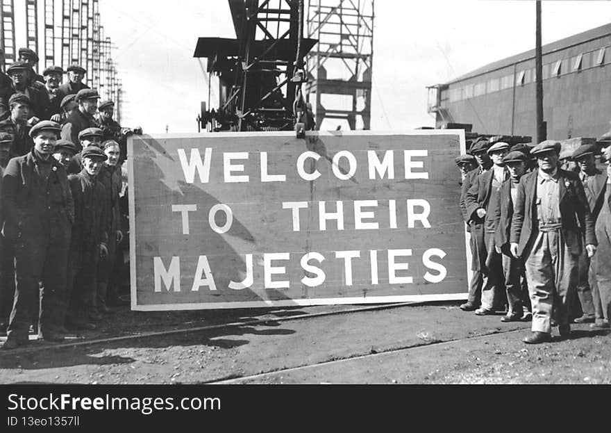 This is a photograph of Shipyard workers standing beside a sign reading &#x27;Welcome to their Majesties&#x27; and welcoming King George VI and Queen Elizabeth to the shipyard of John Readhead &amp; Sons Ltd, South Shields, 7 April 1943 

Reference: 1061/1209/4

On 22 November Prince William will be visiting Sunderland and South Tyneside to take part in a number of youth development events.  During the visit he will also officially open Haven Point, the new leisure centre in South Shields.

To celebrate this Tyne &amp; Wear Archives has produced a short flickr set remembering past royal visits to the regionâ€™s shipyards.  Most of the visits featured here took place during difficult times and they gave a real boost to public spirits in the face of two World Wars.

A short blog relating to these images can be read  here .

These images are part of the Tyne &amp; Wear Archives Shipyard Collection. In July 2013 the outstanding historical significance of the Collection was recognised by UNESCO through its inscription to the UK Memory of the World Register.

&#x28;Copyright&#x29; We&#x27;re happy for you to share these digital images within the spirit of The Commons. Please cite &#x27;Tyne &amp; Wear Archives &amp; Museums&#x27; when reusing. Certain restrictions on high quality reproductions and commercial use of the original physical version apply though; if you&#x27;re unsure please email archives@twmuseums.org.uk